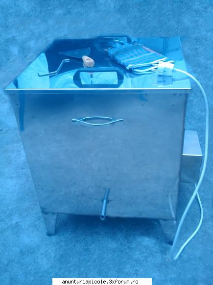 puteti sa-mi dati detalii despre    topitor ceara electric cu presa      2150 o poza sau un link